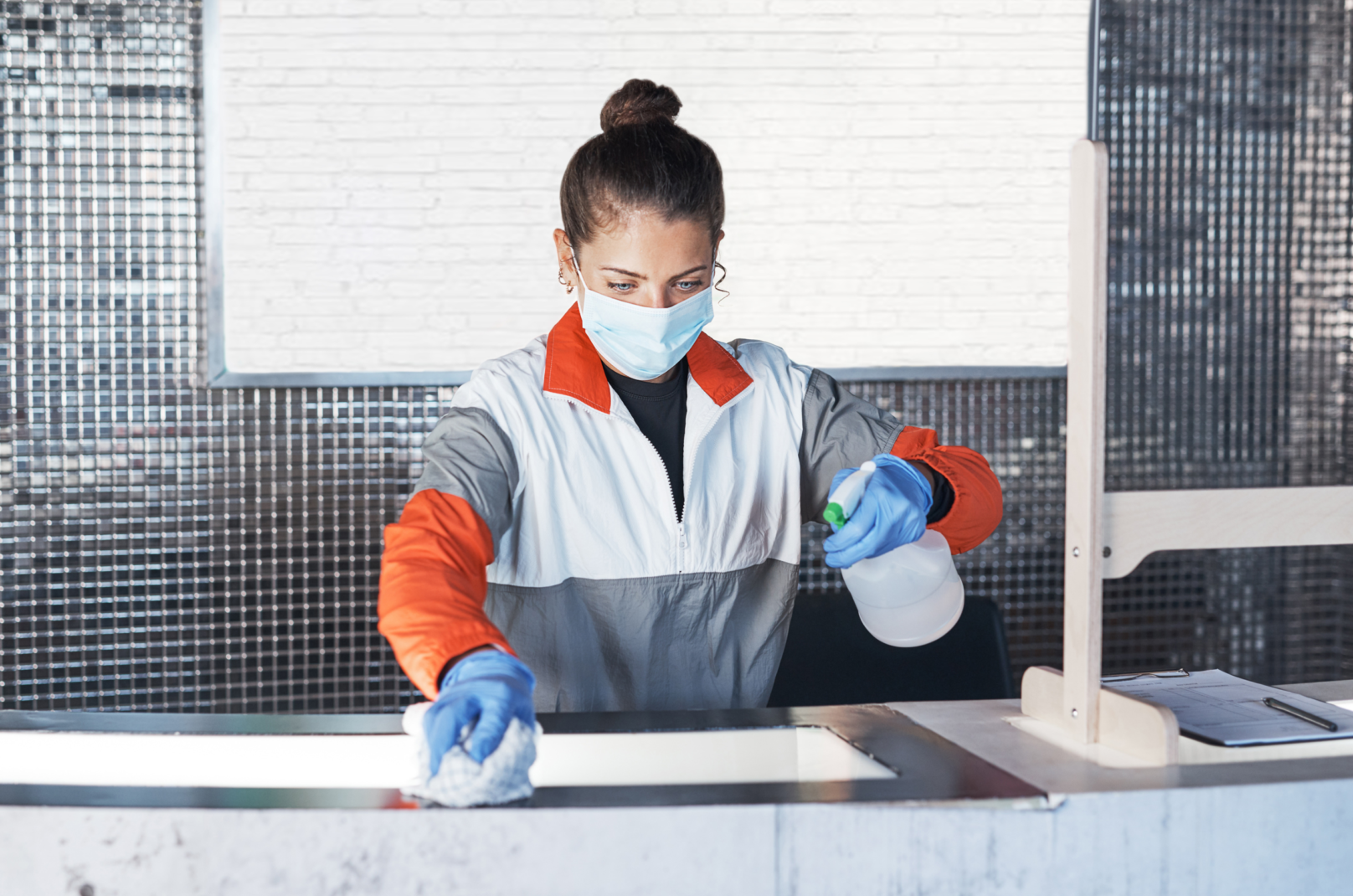 woman-face-mask-clean-desk-gym-with-sanitiser-spray-hygiene-compliance-chemical-maintenance-girl-wipe-detergent-with-covid-safety-dust-bacteria-pandemic-protection-wellness.webp
